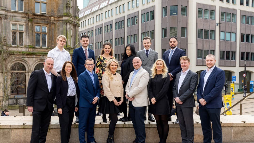Clare Lang (front row centre) with Corporate team